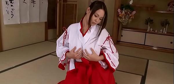  Brunette Asian in a red and white kimono rubs her cunt